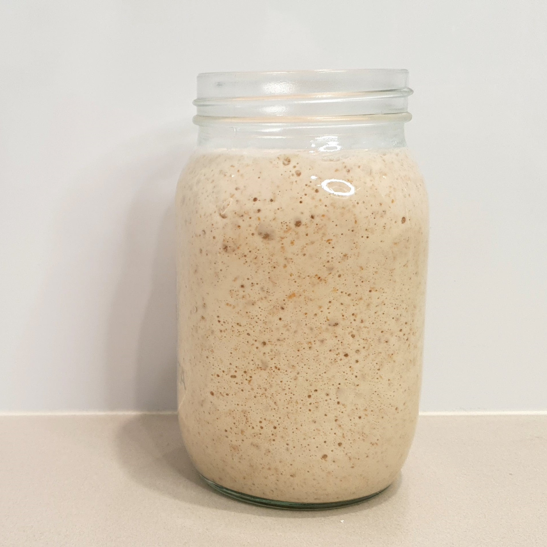 Sourdough starter in a glass jar